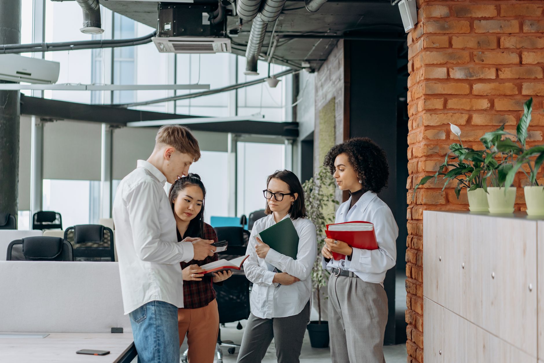 Microbrowse team collaborating in a modern office